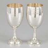 2-piece set of silver prize goblets.