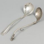 2-piece lot of silver jam spoons.