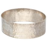 Sterling silver hammered bangle bracelet by Swedish designer Per-Allan Åhrberg.