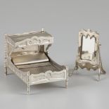 Miniature bedstead and full length mirror silver.