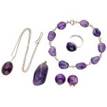 Lot consisting of five various silver jewelry set with amethyst.