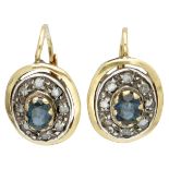 Vintage 18K. yellow gold earrings set with approx. 0.96 ct. natural sapphire and diamond.