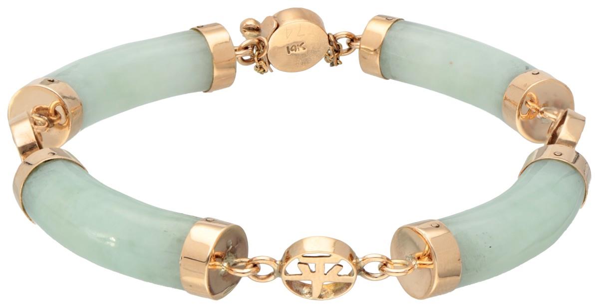 Jade bracelet with Chinese characters in 14K. yellow gold.