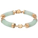 Jade bracelet with Chinese characters in 14K. yellow gold.