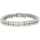 14K. White gold double tennis bracelet set with approx. 6.90 ct. diamond.