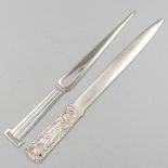 2 letter openers silver.
