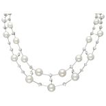 Exclusive Stefan Hafner 18K. white gold necklace set with approx. 3.16 ct. diamond and pearls.