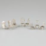 8-piece lot of miniature chairs, silver.