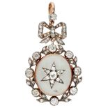 18K. Rose gold Victorian 'Pool of Light' locket with ribbon bow, set with approx. 4.90 ct. diamond a