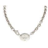 Sterling silver 'Please Return to Tiffany & Co.' oval tag link necklace.