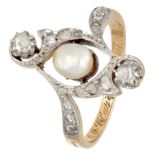 Antique 14K. yellow gold ring set with a pearl and rose cut diamonds.