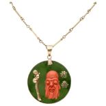 BLA 9K. yellow gold necklace and pendant with a red coral sage set on jade in a 14K. gold frame.