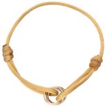 Cartier 18K. tricolor gold 'Trinity' bracelet with a beige cord.