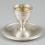 Egg cup on saucer, silver.