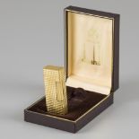 Dunhill lighter 18 kt gold.