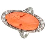 14K. White gold vintage ring set with approx. 0.32 ct. diamond and a red coral cameo.
