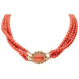 Vintage three-row red coral necklace with a 14K. yellow gold closure.