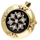 Antique 14K. yellow gold brooch / pendant set with diamond in silver set on onyx.