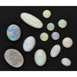 Lot of 13 cabochon cut natural white precious opals.