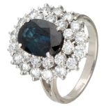 18K. White gold entourage ring set with approx. 2.98 ct. natural sapphire and approx. 2.00 ct. diamo