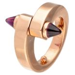 Cartier 'Menotte' 18K. yellow gold ring set with bullet cabochon cut rhodolite garnets.