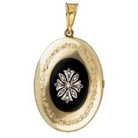 Vintage 14K. yellow gold medallion pendant with diamond set on onyx.