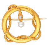 Victorian 18K. yellow gold snake brooch set with a diamond and a pearl.
