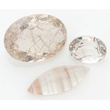 Lot of 3 natural rock crystals with various inclusions.