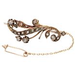 Antique 14K. rose gold brooch set with rose cut diamonds.