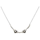 14K. White gold Art Deco necklace set with approx. 0.10 ct. diamond set on onyx.