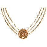 Antique 14K. yellow gold 19th century three-row necklace with a filigree pendant.