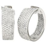 14K. White gold creole earrings set with approx. 3.90 ct. diamond.