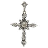 Antique sterling silver cross-shaped pendant set with rose cut diamonds.