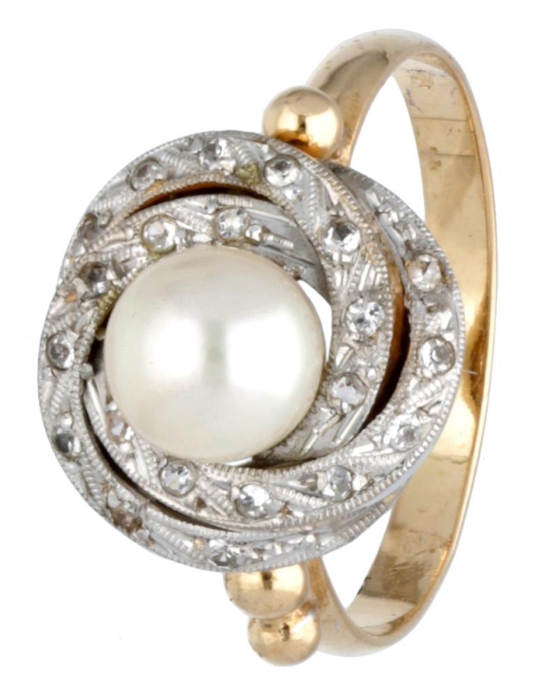 14K. Bicolor gold ring set with a white pearl and cubic zirconia.