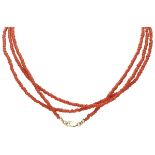 Single strand red coral necklace with a BLA 10K. yellow gold closure.