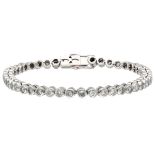 18K. White gold tennis bracelet set with approx. 2.25 ct. diamond.