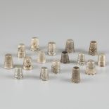 16-piece lot of silver thimbles.