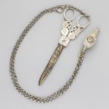 Haberdashery scissors with chatelaine chain and silver skirt hook.