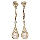 14K. White gold Art Deco earrings set with diamonds and pearls.