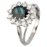 18K. White gold entourage ring set with approx. 2.00 ct. natural sapphire and approx. 0.84 ct. diamo