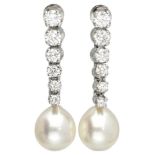 18K. White gold earrings set with approx. 0.85 ct. diamond and pearl.