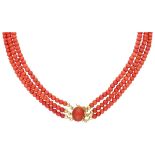 Vintage three-row red coral necklace with a 14K. yellow gold closure.