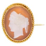 Vintage 18K. yellow gold cameo brooch with an in profile lady's portrait.