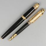 2-piece lot Cartier ballpoint pens silver.