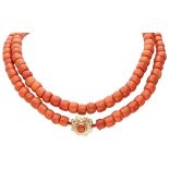 Large single strand red coral necklace with a 14K. yellow gold closure.