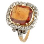 Antique 18K. yellow gold entourage ring set with approx. 2.75 ct. garnet and diamond.