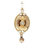 14K. Yellow gold antique pendant set with a seed pearl.