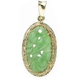 14K. Yellow gold vintage pendant set with jade with a carved depiction of a bird.