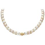 Vintage pearl necklace with a 14K. yellow gold openwork closure.