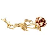 14K. Bicolor gold rose shaped brooch.